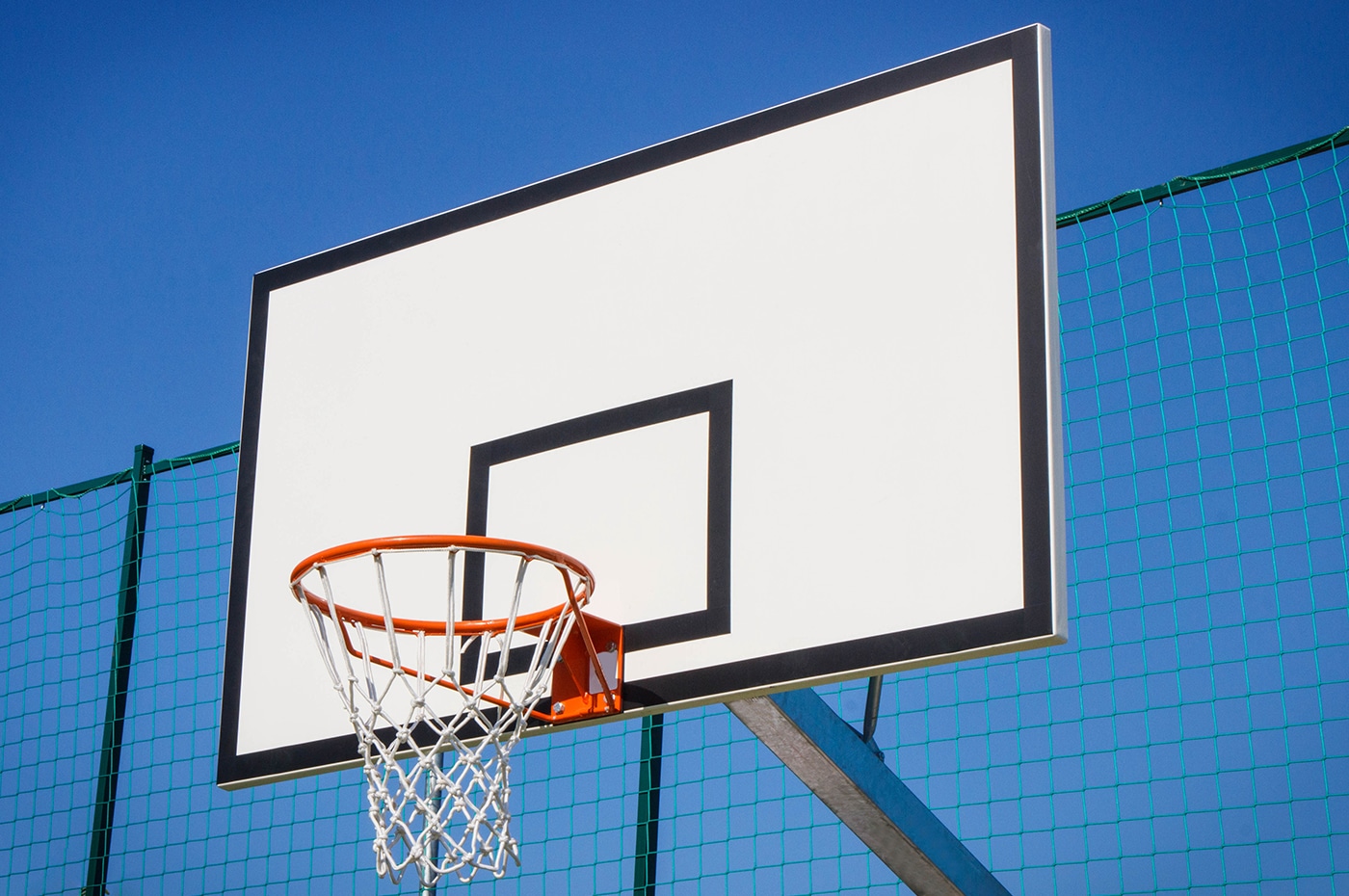 Basketball Board With Basket Hoop On Playground. Sport, Recreation And Healthy Lifestyles On Fresh Air